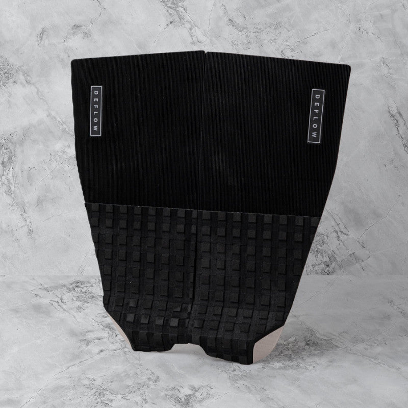 Deflow 2 Piece pad black deck grip for surfing with textured design.