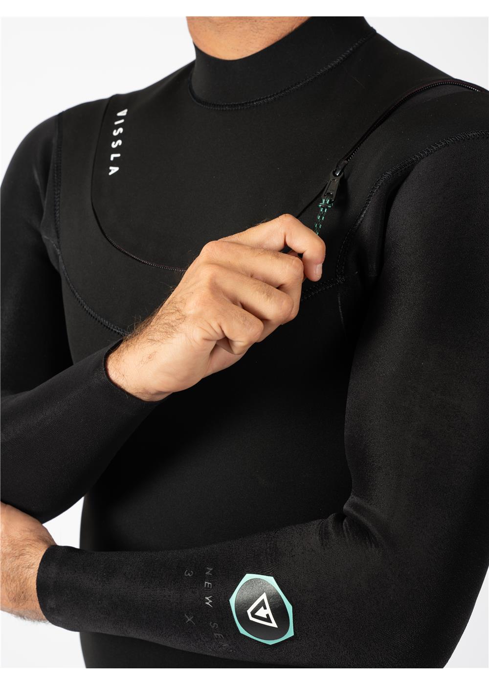 Close-up of Vissla New Seas wetsuit sleeve and logo details.