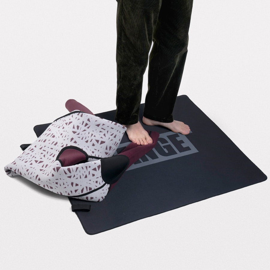 Range Neoprene Mat in use with folded items placed on it.