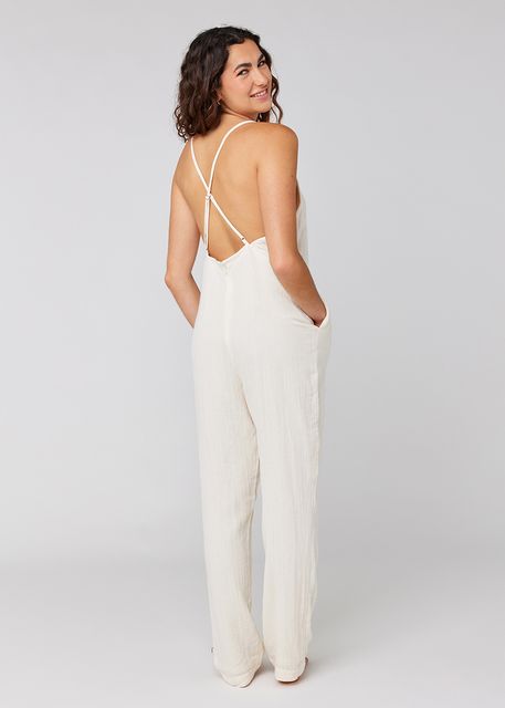 Sisstrevolution Happy Here romper in Sea Salt, back view with crisscross straps.